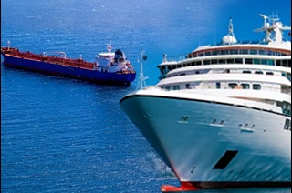 A blurry cruise ship superimposed on a cargo ship in the ocean
