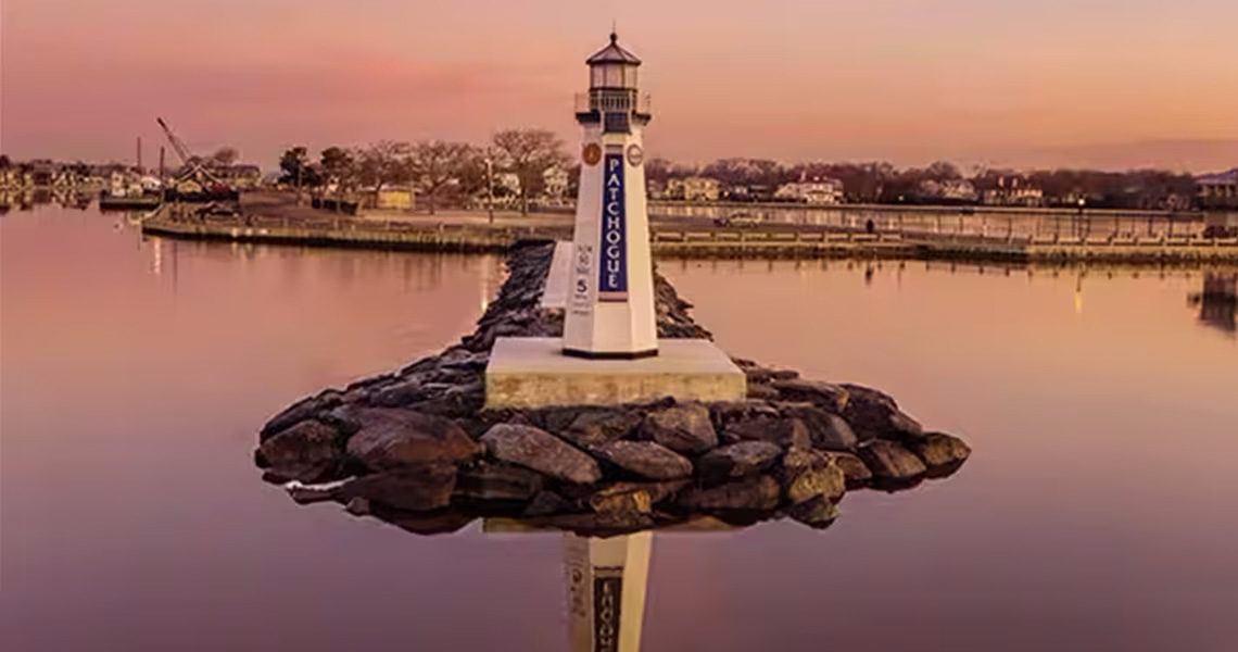 A lighthouse at sunset in the Village of Patchogue