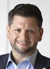 Headshot of Nick Treder, director of Sports and Entertainment, Johnson Controls