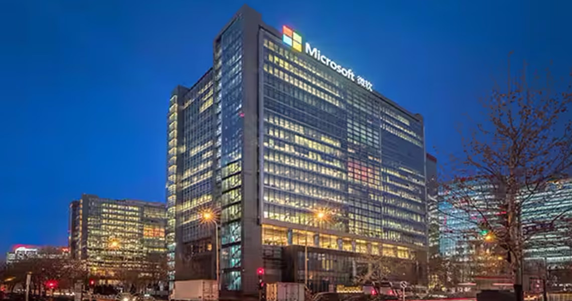 The Microsoft West Campus building lit up at night