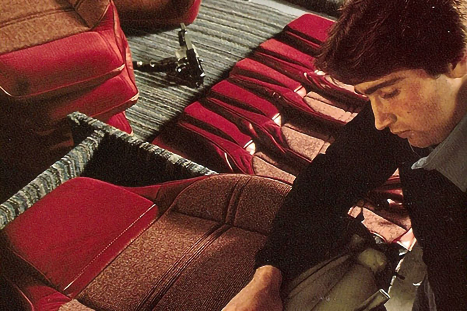 Hoover Universal employee assembling a seat