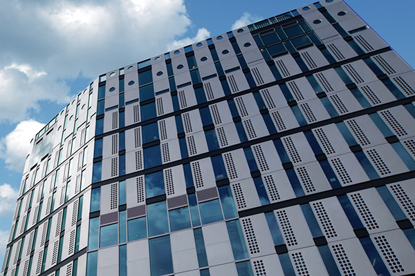 Exterior of a commercial building under the blue sky