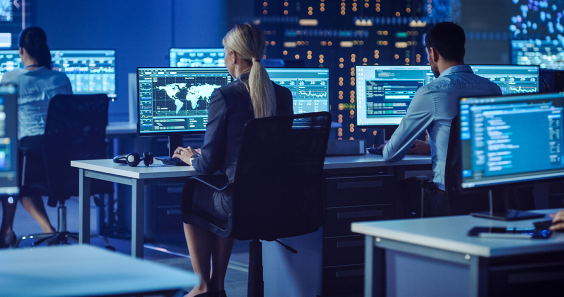 Employees working on their computers
