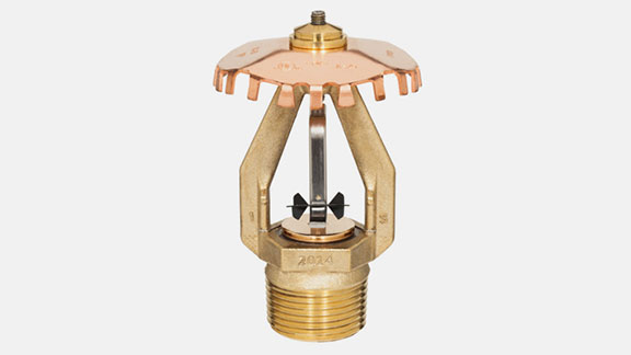 golden sprinkler on a grey background