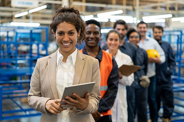 Employees stand in a line