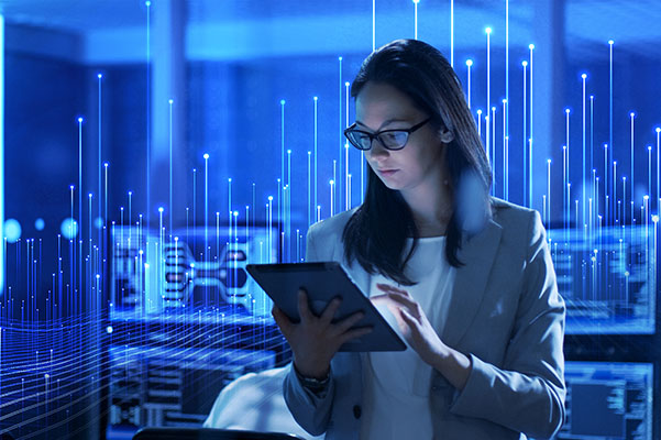 woman using a tablet in office